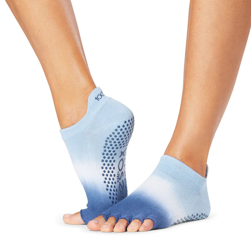 Our performance toeless grip socks provide the barefoot sensation